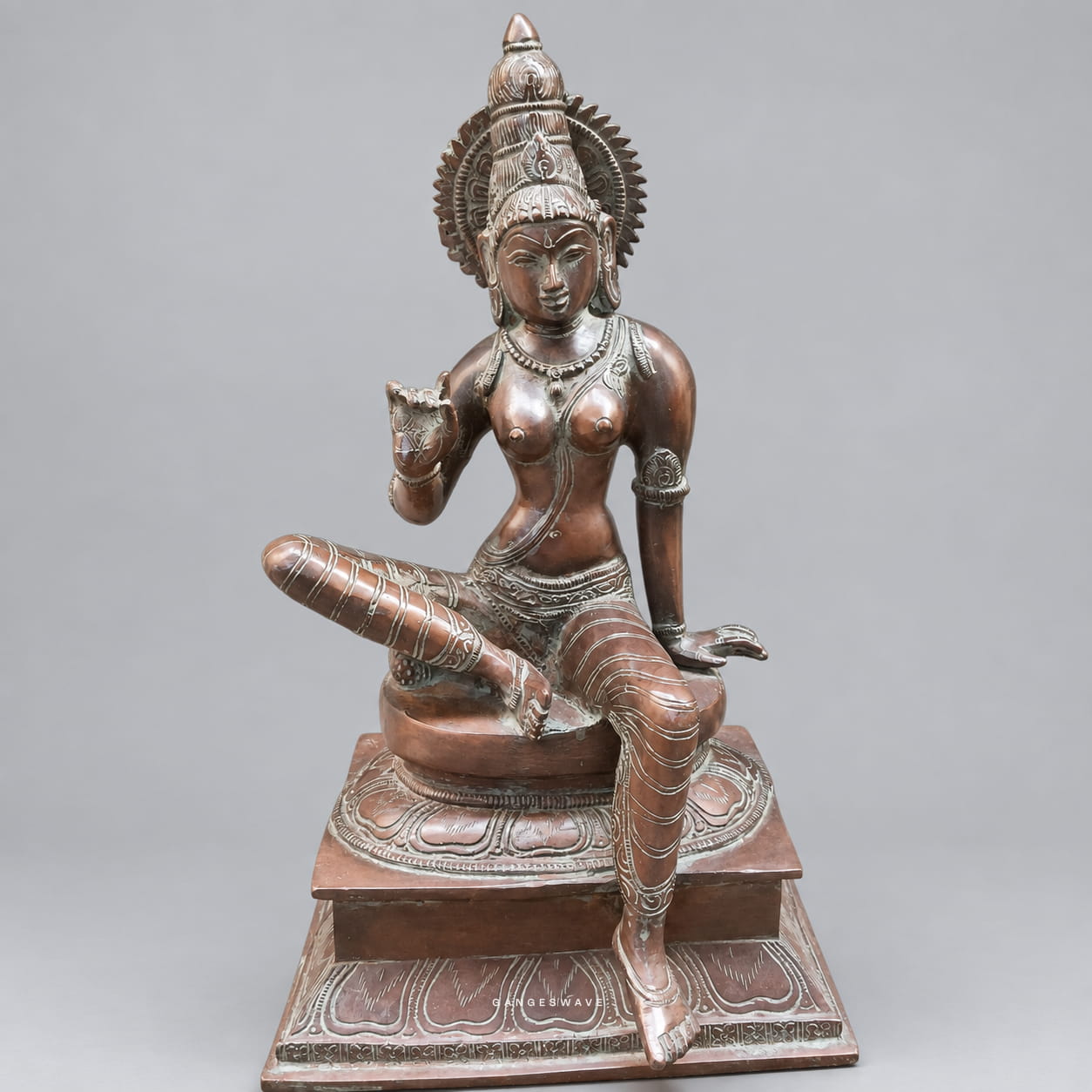 Vintage brass Parvati statue seated with intricate traditional detailing