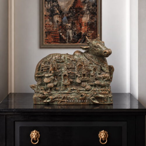 Kashi Banaras Nandi brass sculpture featuring intricate temple and cityscape relief across its body